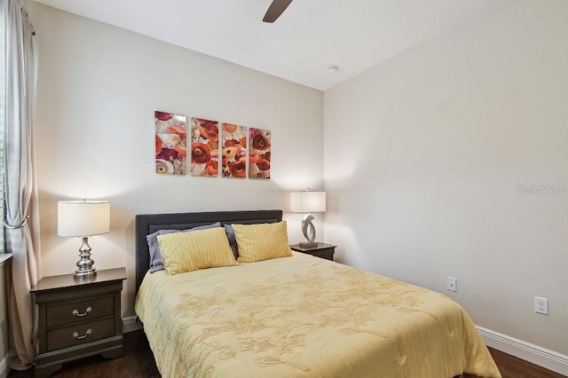 1140 Terralago Way, Kissimmee, FL 34746 - bedroom featuring dark wood-style floors, baseboards, and a ceiling fan