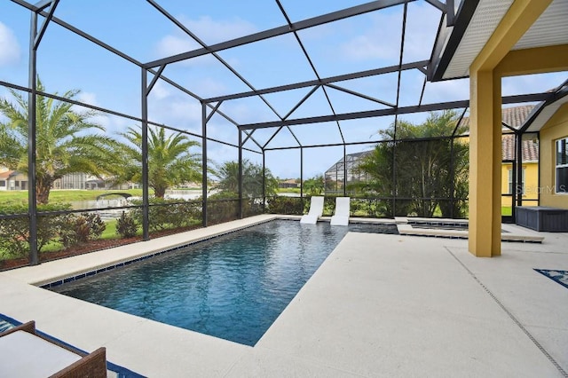 1140 Terralago Way, Kissimmee, FL 34746 - swimming pool featuring a patio area and glass enclosure