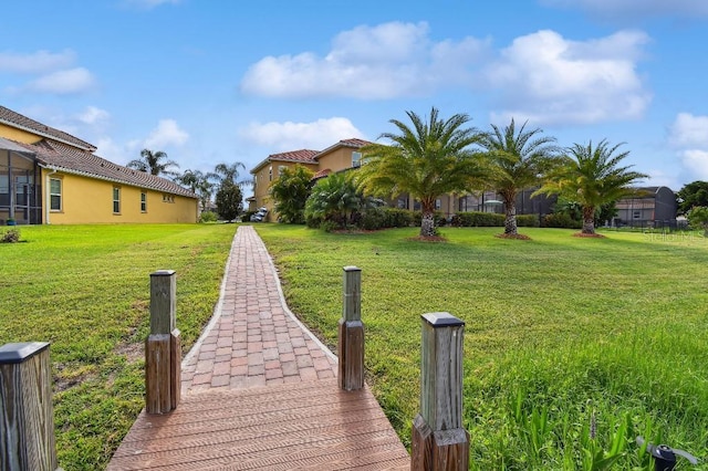 1140 Terralago Way, Kissimmee, FL 34746 - surrounding community featuring a yard