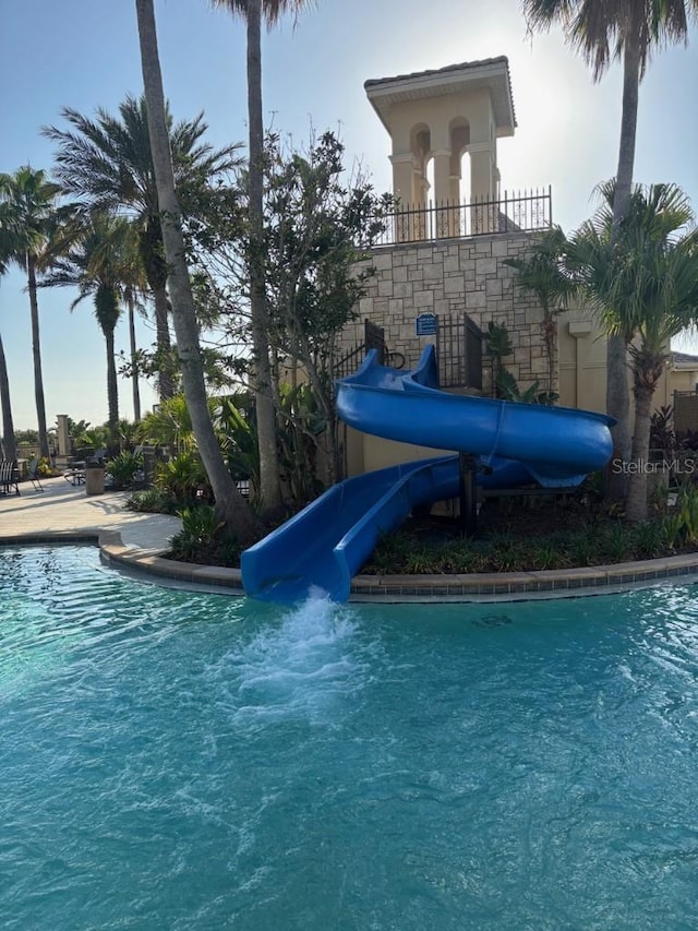 1140 Terralago Way, Kissimmee, FL 34746 - community pool with a water slide