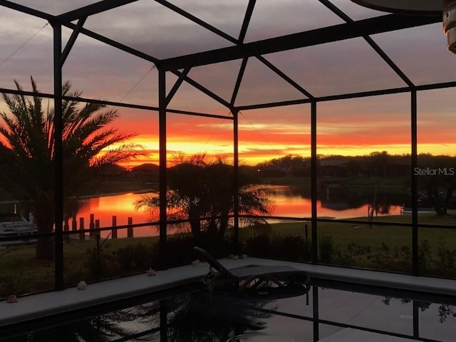 1140 Terralago Way, Kissimmee, FL 34746 - swimming pool with a water view and glass enclosure