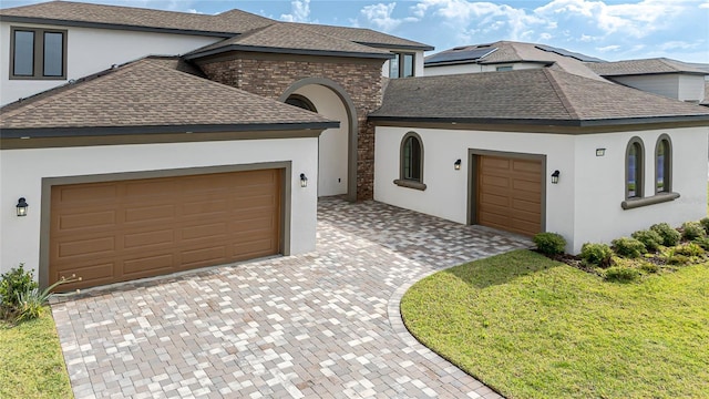 8834 Sanders Tree Loop, Wesley Chapel, FL 33545 - french country inspired facade featuring a shingled roof, a garage, and stucco siding
