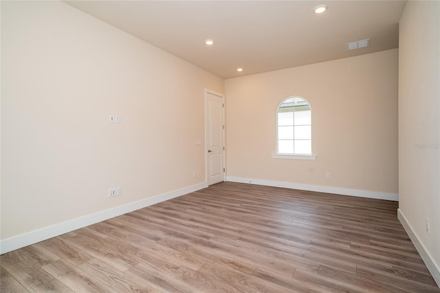 8834 Sanders Tree Loop, Wesley Chapel, FL 33545 - empty room with wood finished floors, recessed lighting, and baseboards