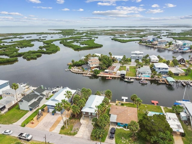 3285 Minnow Creek Dr, Hernando Beach, FL 34607 - aerial perspective of suburban area with a nearby body of water