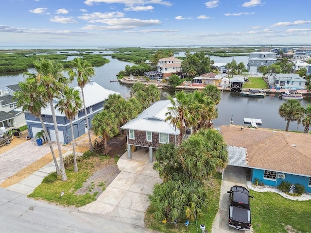 3285 Minnow Creek Dr, Hernando Beach, FL 34607 - aerial view of residential area featuring a nearby body of water