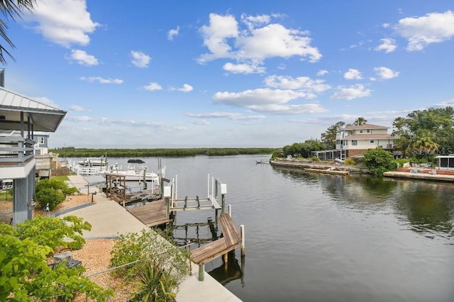 3285 Minnow Creek Dr, Hernando Beach, FL 34607 - dock area featuring boat lift and a water view