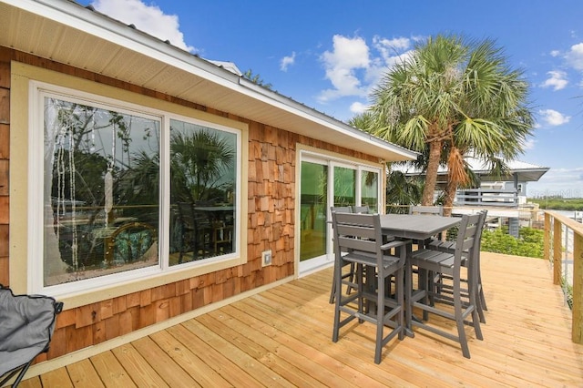 3285 Minnow Creek Dr, Hernando Beach, FL 34607 - wooden deck featuring outdoor dining space