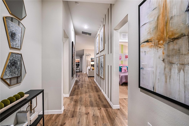 1716 Vanilla St, Haines City, FL 33844 - hall featuring wood finished floors and baseboards
