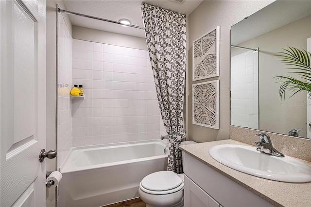 1716 Vanilla St, Haines City, FL 33844 - bathroom featuring toilet, shower / bathtub combination with curtain, and vanity