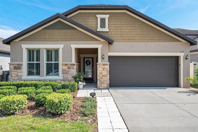 11314 American Holly Dr, Riverview, FL 33578 - craftsman house featuring stone siding, stucco siding, a garage, and driveway