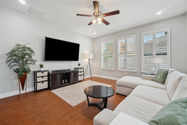 11314 American Holly Dr, Riverview, FL 33578 - living area featuring a ceiling fan, baseboards, wood finished floors, and recessed lighting