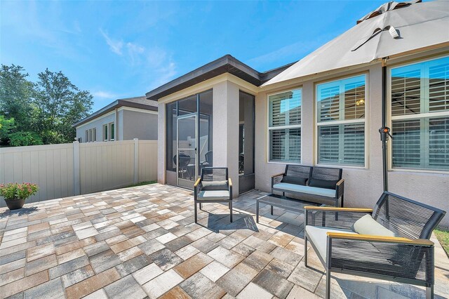 11314 American Holly Dr, Riverview, FL 33578 - view of patio / terrace featuring a sunroom and outdoor lounge area