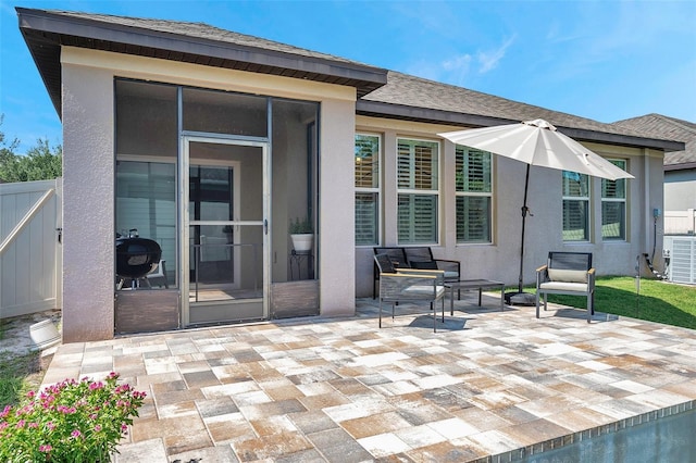 11314 American Holly Dr, Riverview, FL 33578 - rear view of house featuring a patio area, stucco siding, cooling unit, and a sunroom