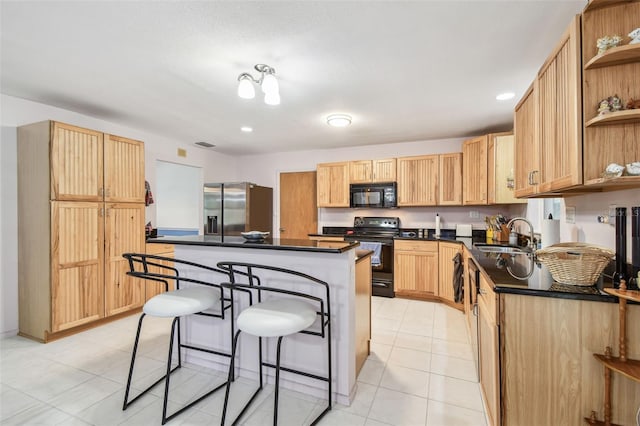 17801 Simmons Rd, Lutz, FL 33548 - kitchen featuring black appliances, dark countertops, a sink, open shelves, and light tile patterned floors