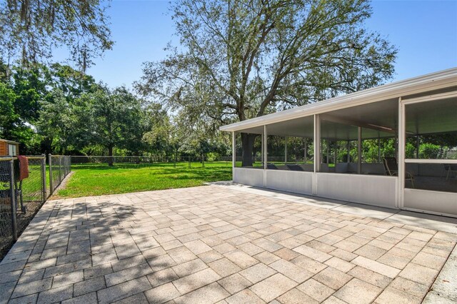 17801 Simmons Rd, Lutz, FL 33548 - view of patio featuring a sunroom