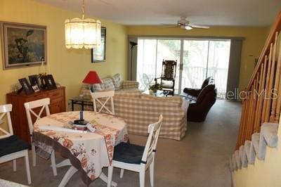 9722 Indian Key Trl Unit 116, Seminole, FL 33776 - carpeted dining area featuring ceiling fan