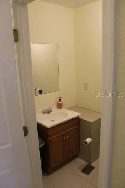 9722 Indian Key Trl Unit 116, Seminole, FL 33776 - bathroom featuring vanity and tile patterned flooring