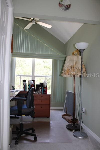 9722 Indian Key Trl Unit 116, Seminole, FL 33776 - office area with healthy amount of natural light, a ceiling fan, vaulted ceiling, and baseboards