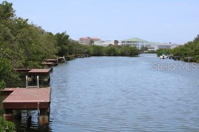 9722 Indian Key Trl Unit 116, Seminole, FL 33776 - water view with a boat dock