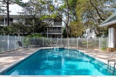 9722 Indian Key Trl Unit 116, Seminole, FL 33776 - community pool with a patio area