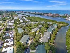 9722 Indian Key Trl Unit 116, Seminole, FL 33776 - aerial overview of property's location with a nearby body of water