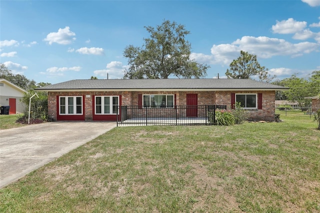 1212 Blake Ave, Auburndale, FL 33823 - ranch-style house featuring brick siding and driveway