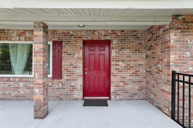 1212 Blake Ave, Auburndale, FL 33823 - entrance to property featuring brick siding