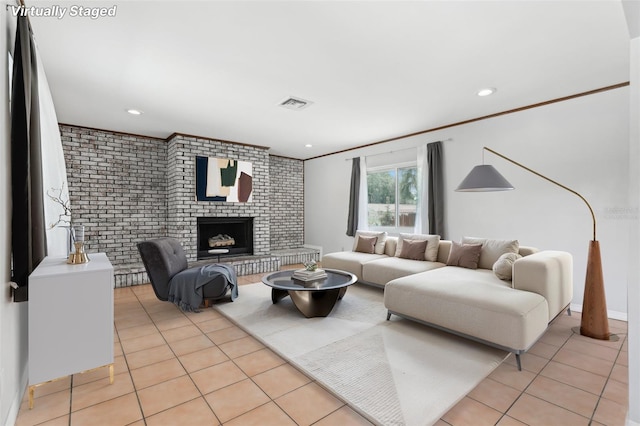 1212 Blake Ave, Auburndale, FL 33823 - living area with light tile patterned flooring, a fireplace, ornamental molding, brick wall, and recessed lighting