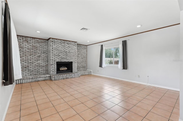 1212 Blake Ave, Auburndale, FL 33823 - unfurnished living room with ornamental molding, a fireplace, baseboards, recessed lighting, and light tile patterned floors