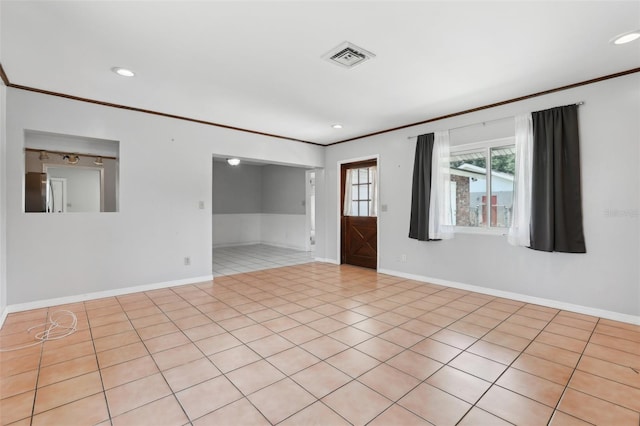1212 Blake Ave, Auburndale, FL 33823 - empty room with crown molding, baseboards, recessed lighting, and light tile patterned floors