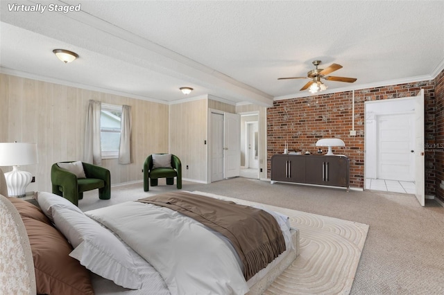 1212 Blake Ave, Auburndale, FL 33823 - bedroom with carpet flooring, crown molding, a textured ceiling, and ceiling fan