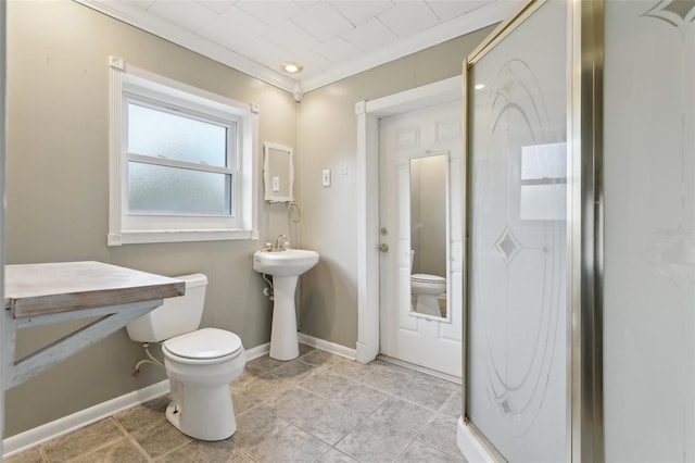 1212 Blake Ave, Auburndale, FL 33823 - bathroom with toilet, ornamental molding, baseboards, tile patterned floors, and a sink