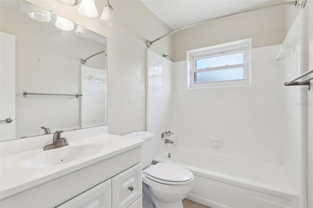 1212 Blake Ave, Auburndale, FL 33823 - bathroom featuring vanity, bathing tub / shower combination, and toilet