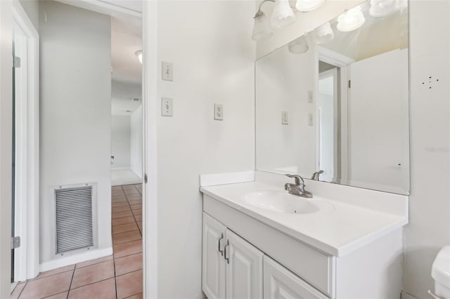 1212 Blake Ave, Auburndale, FL 33823 - half bathroom featuring tile patterned floors, vanity, and toilet