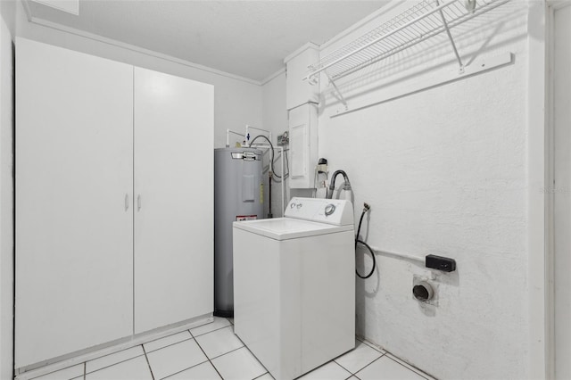 1212 Blake Ave, Auburndale, FL 33823 - laundry room featuring washer / dryer, water heater, and light tile patterned floors