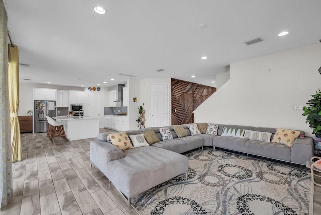 12650 Shetland Walk Dr, Lithia, FL 33547 - living room with recessed lighting and light wood-type flooring