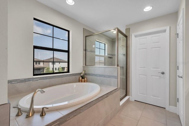 12650 Shetland Walk Dr, Lithia, FL 33547 - bathroom featuring a bath, a shower stall, tile patterned flooring, and recessed lighting