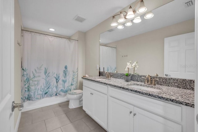 12650 Shetland Walk Dr, Lithia, FL 33547 - bathroom with double vanity, tile patterned floors, toilet, and shower / bath combo with shower curtain
