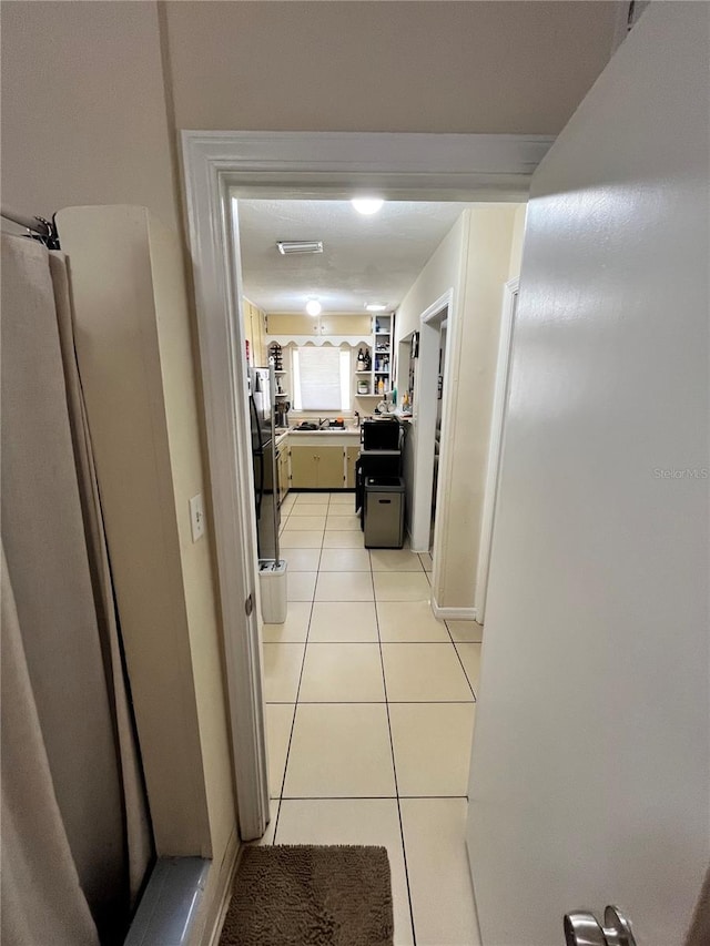 1708 28th St W, Bradenton, FL 34205 - hall featuring light tile patterned flooring