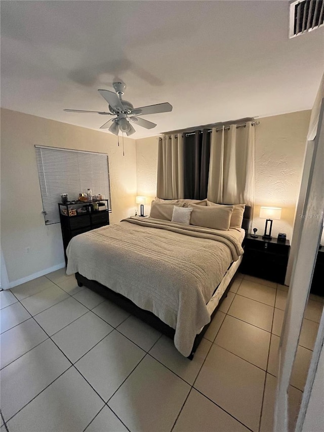 1708 28th St W, Bradenton, FL 34205 - bedroom featuring light tile patterned flooring and ceiling fan