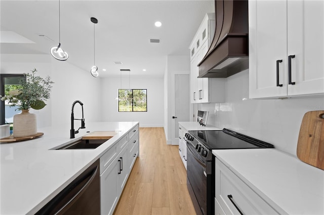 3344 Lagoy St, North Port, FL 34291 - kitchen with black range with electric stovetop, premium range hood, dishwasher, a sink, and white cabinetry