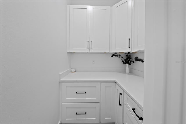 3344 Lagoy St, North Port, FL 34291 - kitchen with white cabinets and light countertops