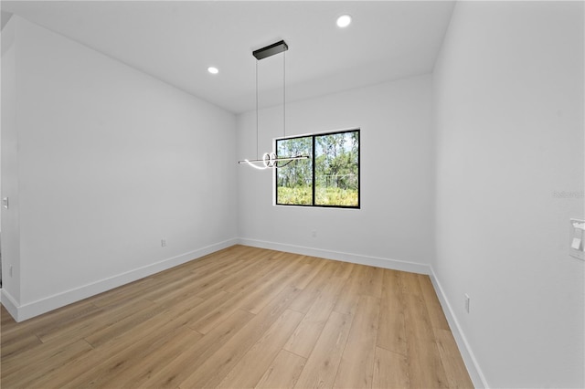 3344 Lagoy St, North Port, FL 34291 - unfurnished room with baseboards, light wood-style floors, and recessed lighting