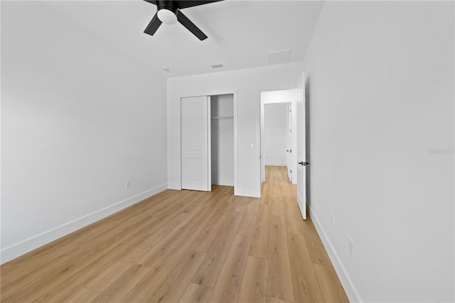 3344 Lagoy St, North Port, FL 34291 - unfurnished bedroom with light wood finished floors, a closet, baseboards, and ceiling fan