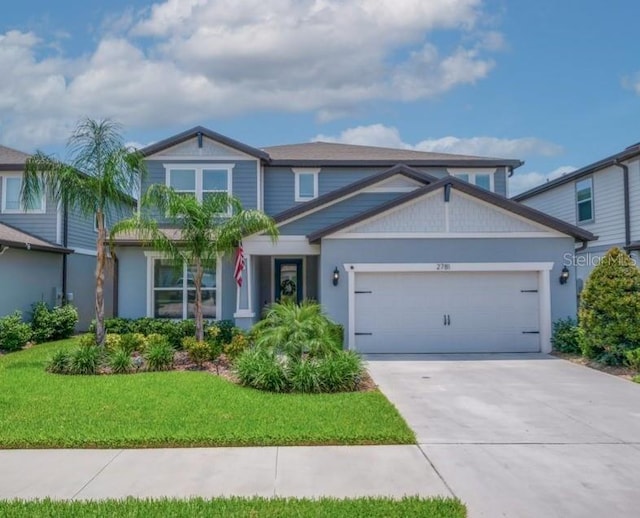 2781 Dolores Home Ave, Valrico, FL 33594 - craftsman inspired home with an attached garage, driveway, and a front yard