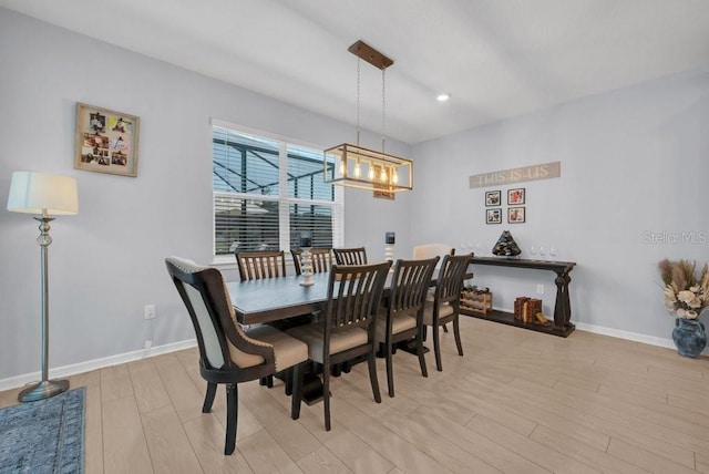 2781 Dolores Home Ave, Valrico, FL 33594 - dining room featuring light wood-type flooring, a chandelier, baseboards, and recessed lighting
