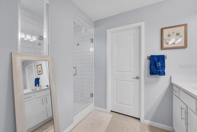 2781 Dolores Home Ave, Valrico, FL 33594 - full bathroom featuring vanity, a shower stall, tile patterned floors, and baseboards