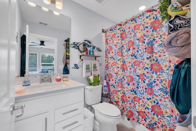 2781 Dolores Home Ave, Valrico, FL 33594 - bathroom featuring vanity, toilet, a ceiling fan, and a shower with shower curtain