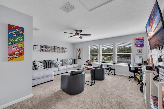 2781 Dolores Home Ave, Valrico, FL 33594 - carpeted living area with a textured ceiling and a ceiling fan