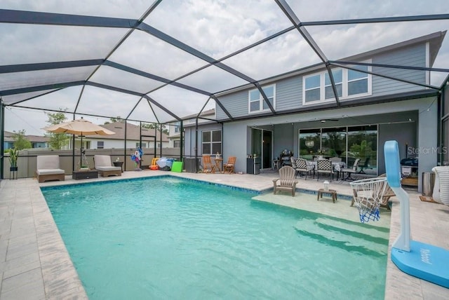 2781 Dolores Home Ave, Valrico, FL 33594 - swimming pool with a patio, glass enclosure, and outdoor dining area